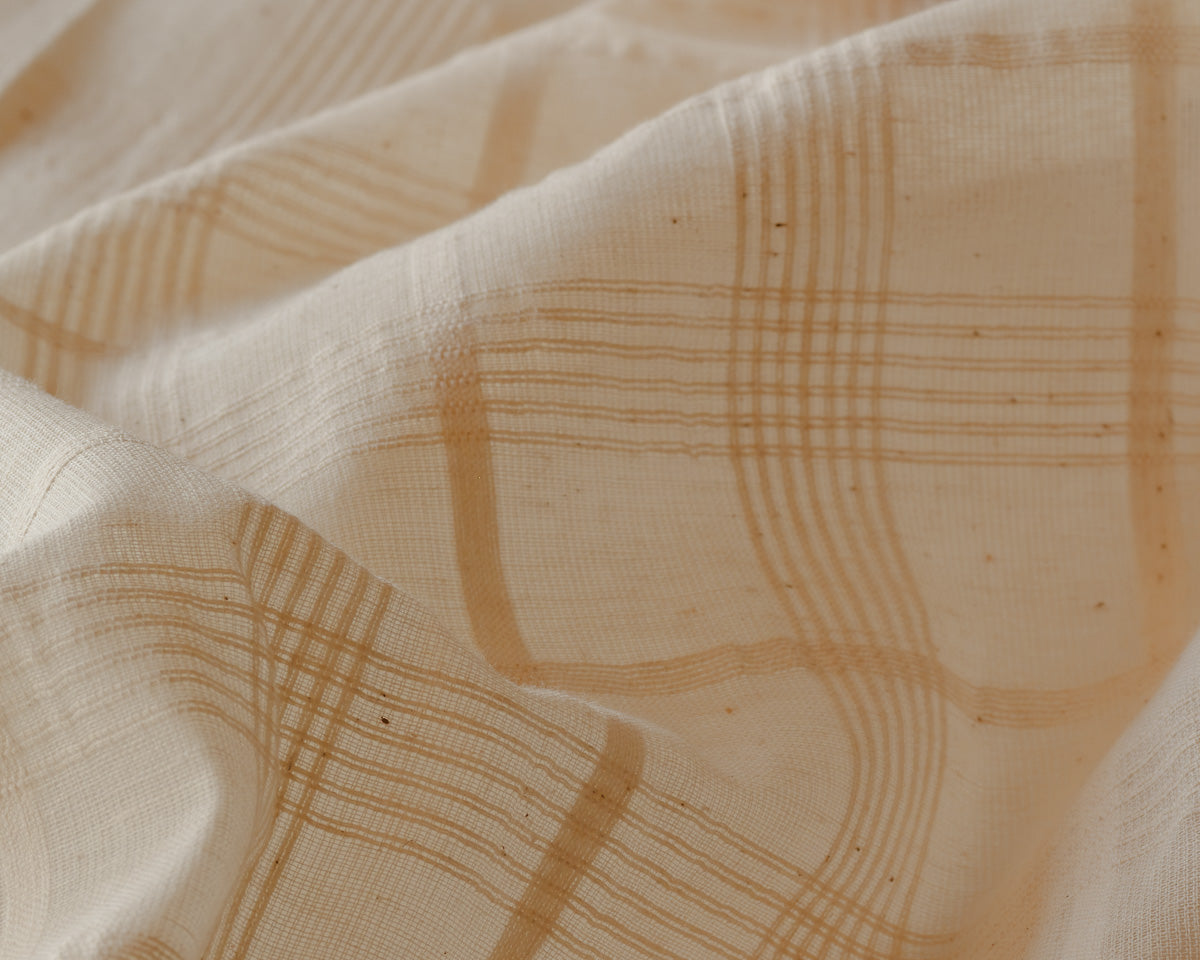 Close-up of Elva cotton in a soft honey windowpane check, a café curtain fabric at Baywell Studio